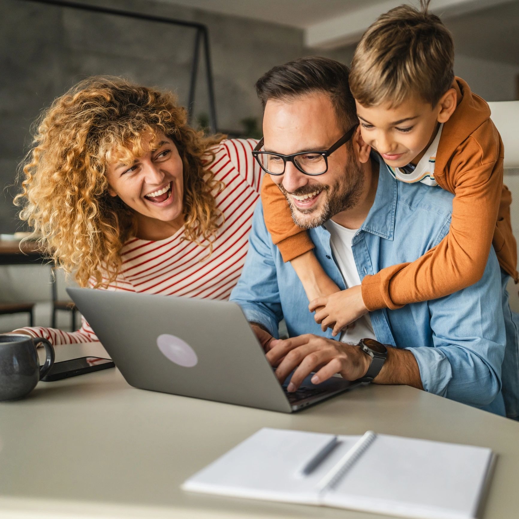 Happy family at laptop